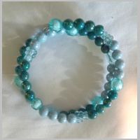 Blue beaded coil bracelet