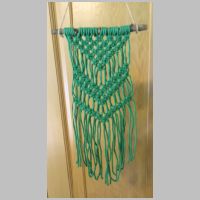 green macrame wall hanging